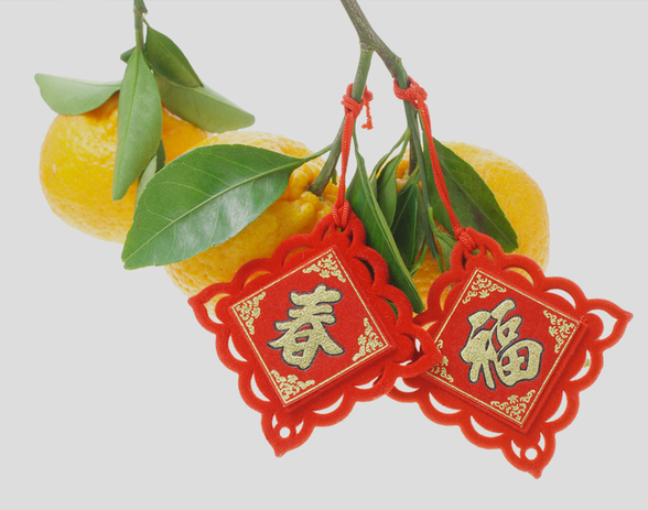 мандарины с еще не оторванными листьями считаются в Китае новогодними фруктами счастья