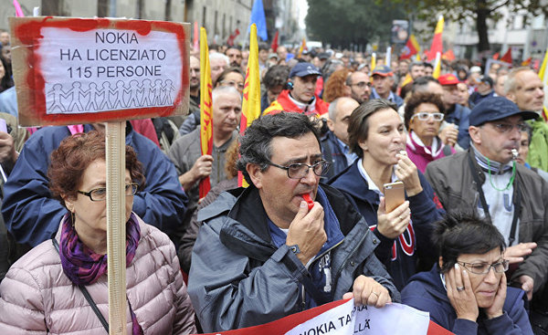 демонстрация против безработицы в Милане, Италия